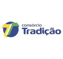 Logotipo do Consórcio Tradição, com um “T” estilizado nas cores amarelo, verde e branco dentro de um círculo azul, com o texto “Consórcio Tradição” à direita. Um símbolo moderno que representa a solidez das soluções do consórcio.