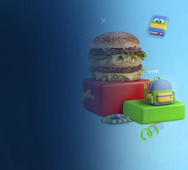 Um hambúrguer Big Mac repousa sobre blocos vermelhos e verdes, cercado por ícones com tema escolar e pelos logotipos do McDia Feliz e do Instituto Ayrton Senna, tudo isso sobre um fundo azul com degradê.